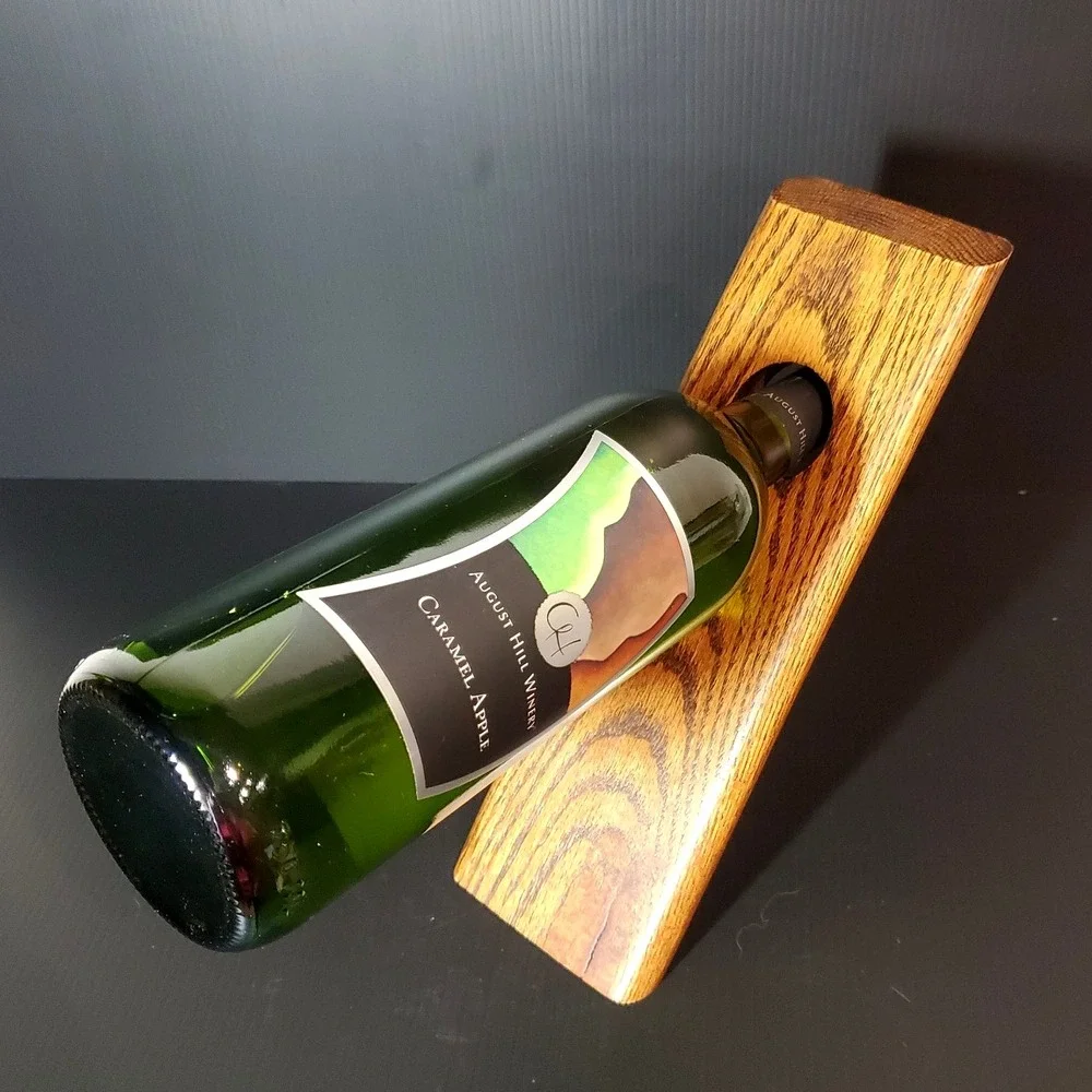 Balancing wine bottle holder, holds a single bottle,‎ solid oak wood